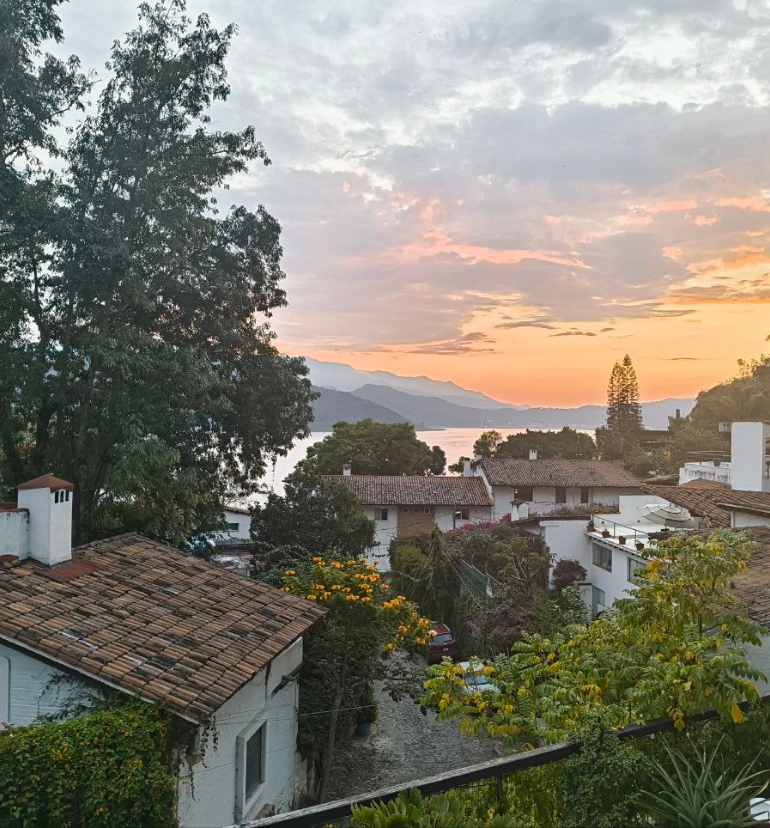 Sunset overlooking the lake of Valle de Bravo and cobblestone streets