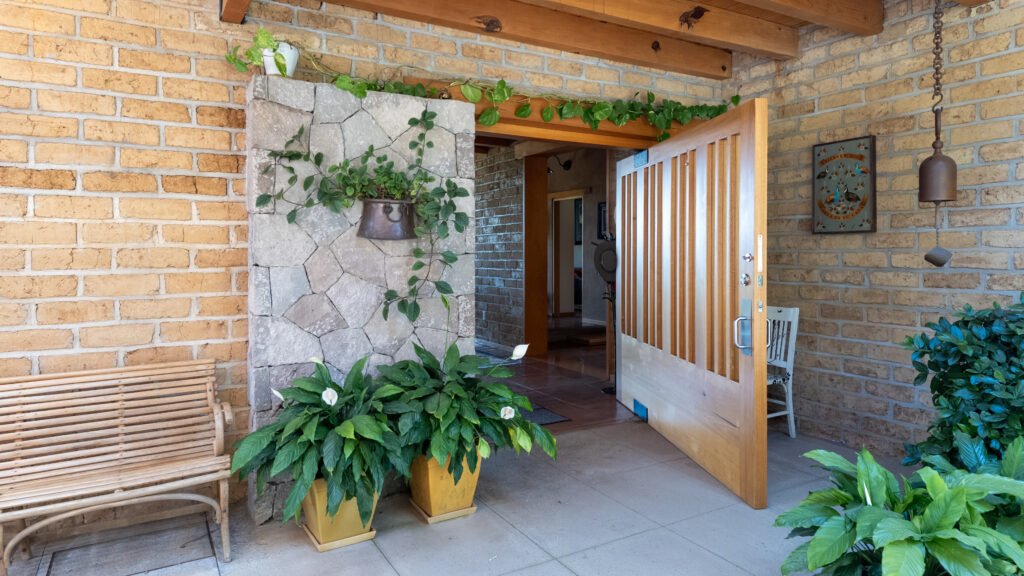 Brick house with stunning custom front door in Valle de Bravo, Mexico